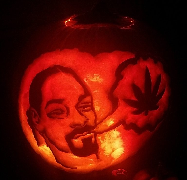 snoop dogg face carved on a pumpkin