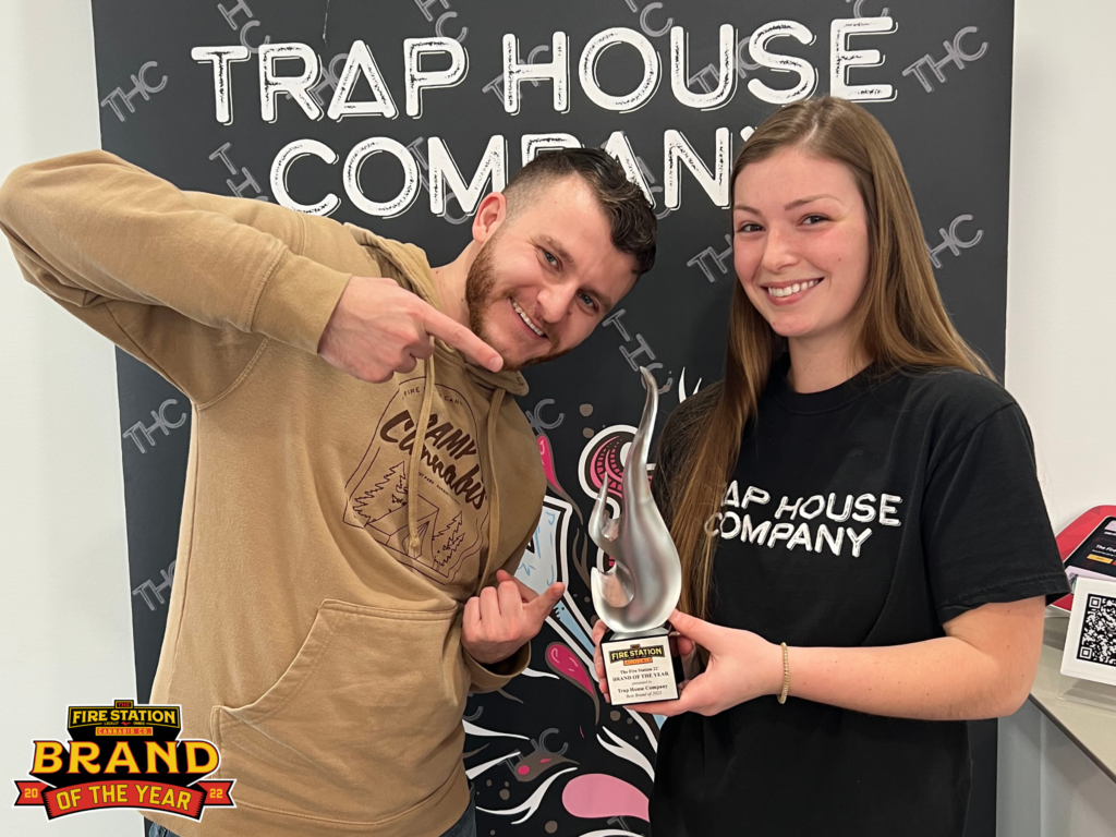 Sean presenting Trap House with the 2022 Brand of the Year trophy