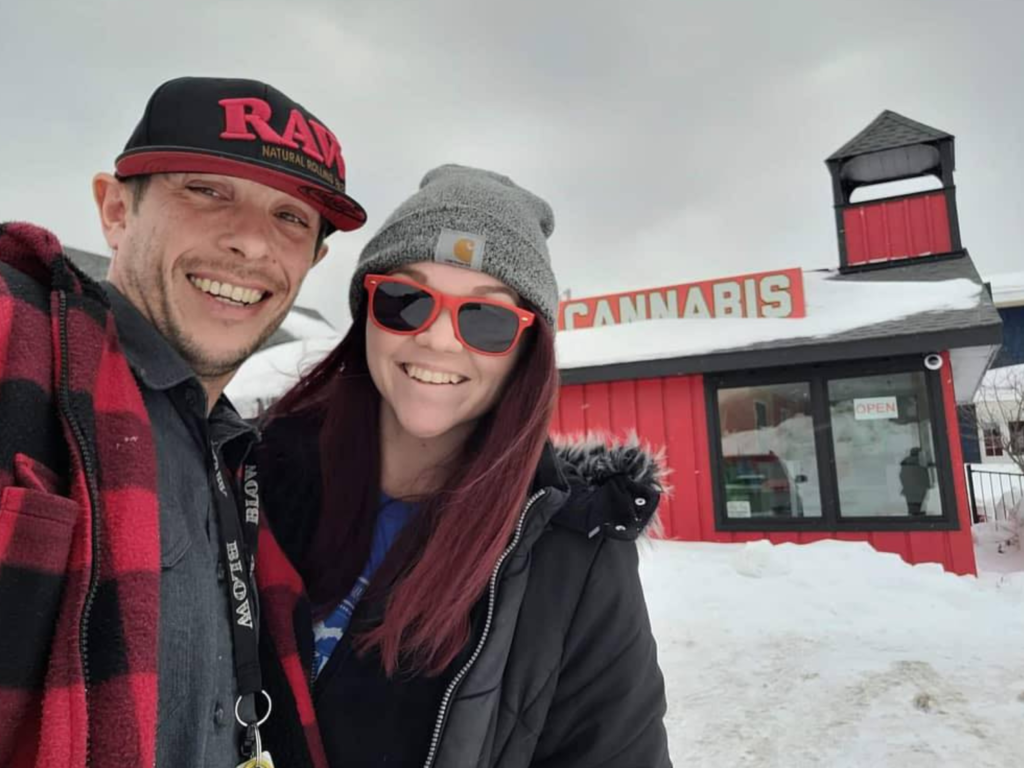 The 906 Canna Couple outside of The Fire Station Cannabis Co. in Munising, Michigan